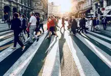 group of people walking on pedestrian lane